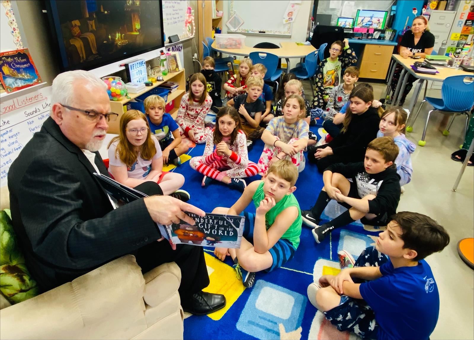 Superintendent Reading to Children